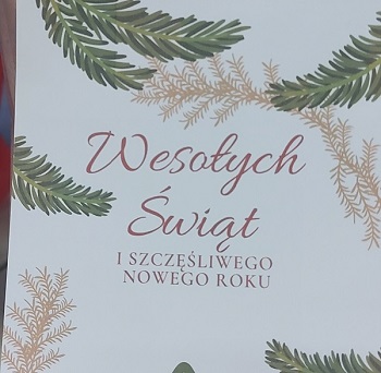 Strona tytułowa kartki z życzeniami z okazji Świąt Bożego Narodzenia i Nowego Roku